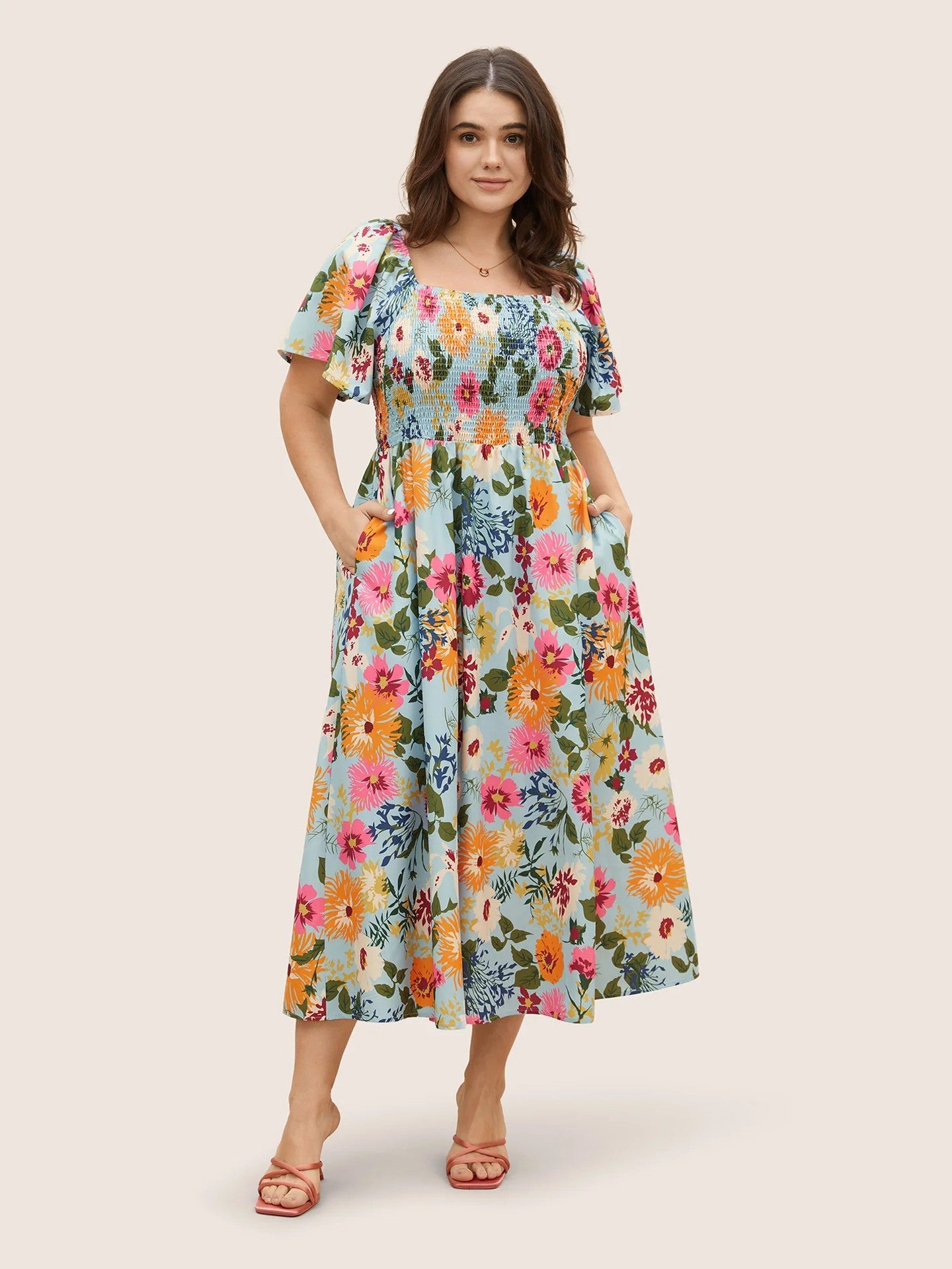 Vibrant Floral Smocked Midi Dress with Puff Sleeves and Pockets