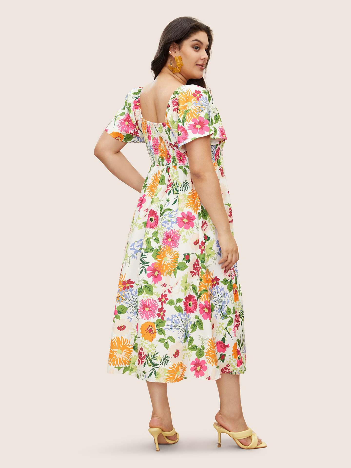 Vibrant Floral Smocked Midi Dress with Puff Sleeves and Pockets