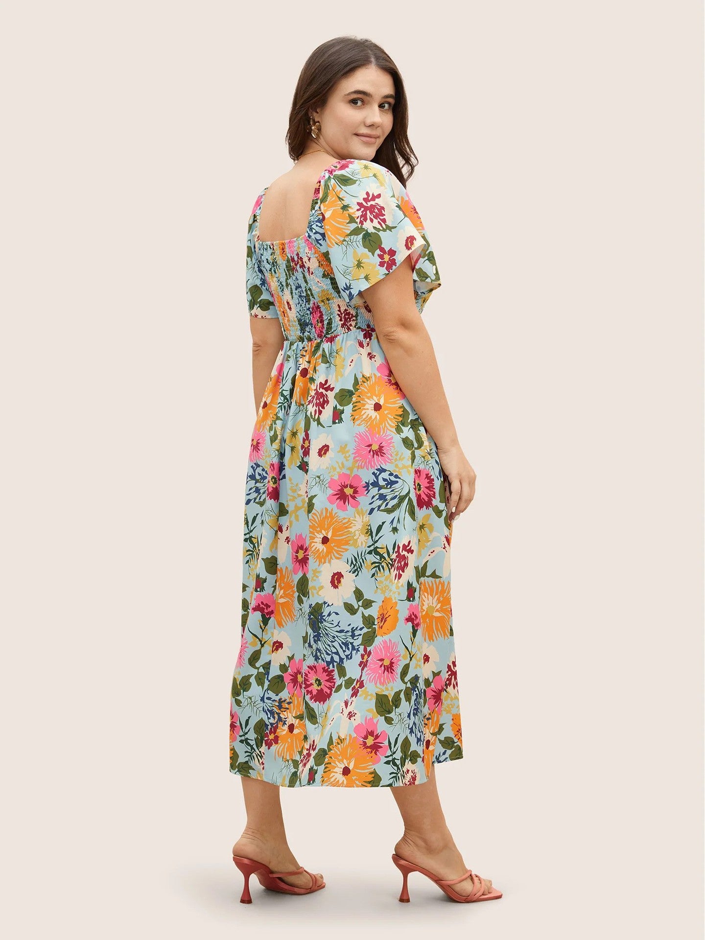 Vibrant Floral Smocked Midi Dress with Puff Sleeves and Pockets