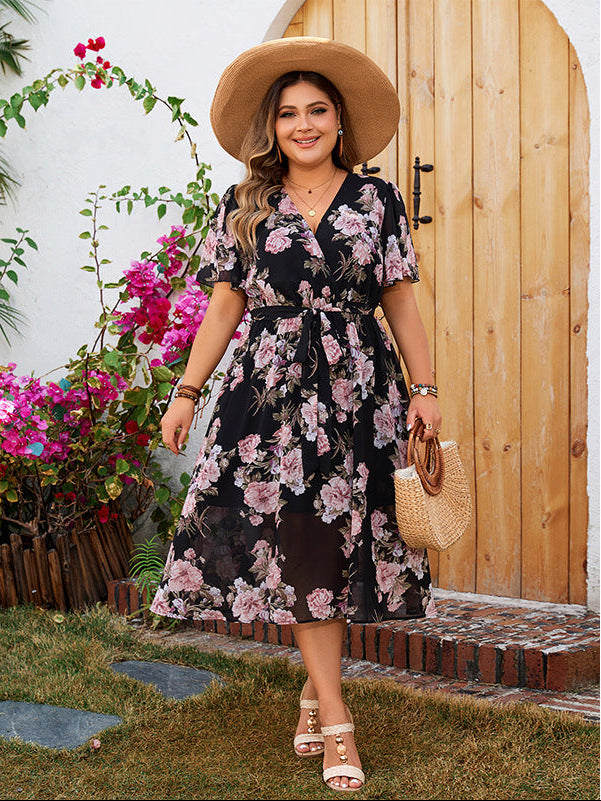 Plus Size Floral Midi Dress – Elegant Black Base with Soft Pink Rose Print, Tie Waist, Short Sleeves