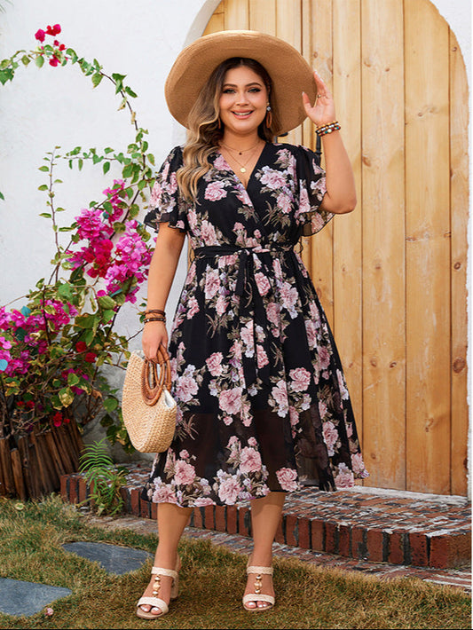 Plus Size Floral Midi Dress – Elegant Black Base with Soft Pink Rose Print, Tie Waist, Short Sleeves